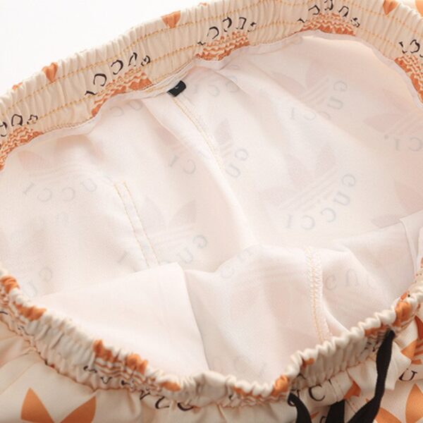 HUKJ-5.jpg GG x Adidas Shorts Trefoil Beige Casual