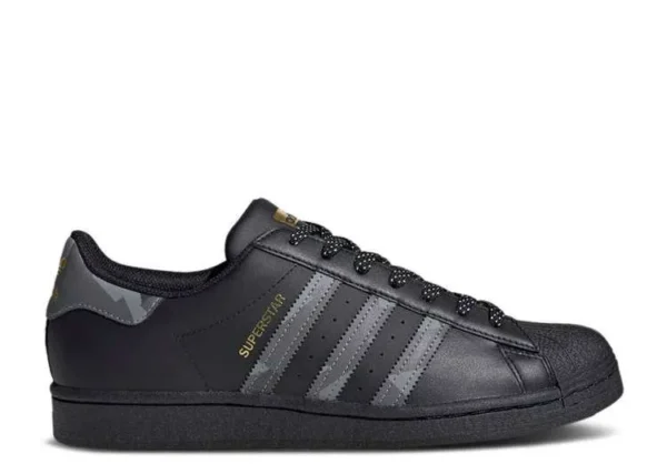 adidas-superstar-black-camo.webp ADIDAS SUPERSTAR ‘BLACK CAMO’