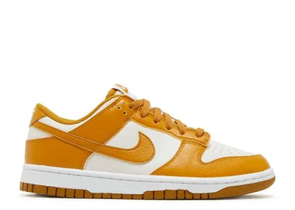 sb-dunk-low-gold-phantom.webp SB DUNK LOW ‘GOLD PHANTOM’